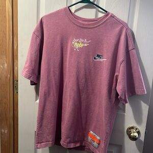 Men’s mauve colored Nike t-shirt. Heavy duty fabric. Like new. Smoke free home.